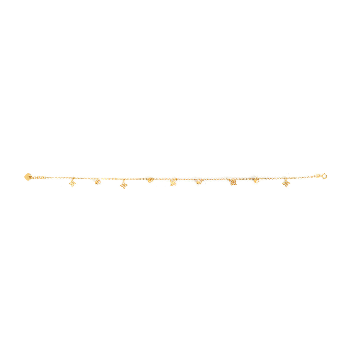 Gold bracelet with small heart-shaped charms on a white background