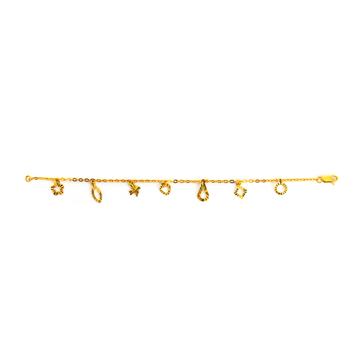 ذهب خلخال مع various charms on white background