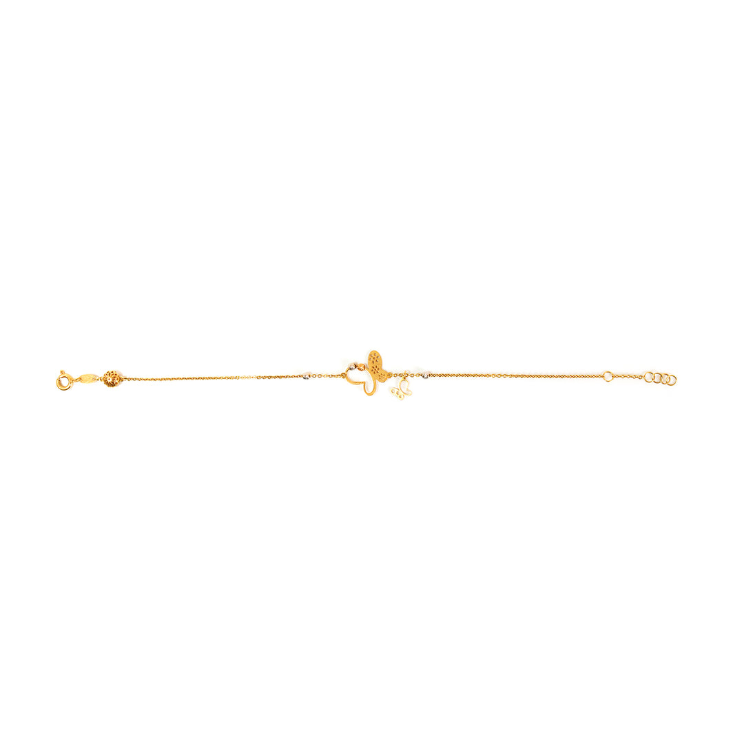 Gold bracelet on a white background