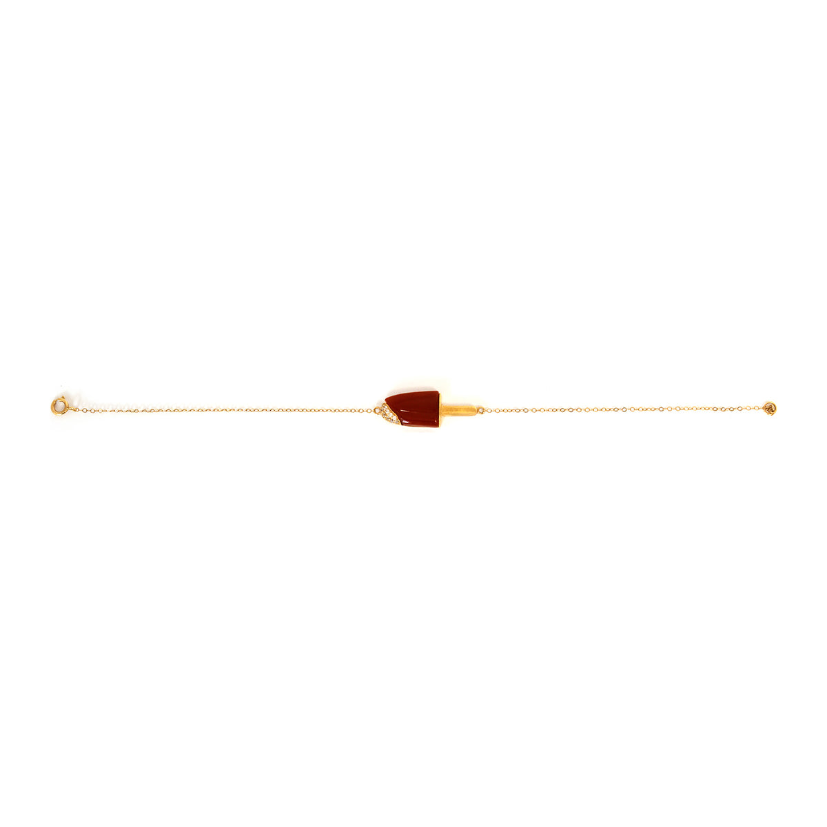 Gold bracelet with a brown accent on a white background