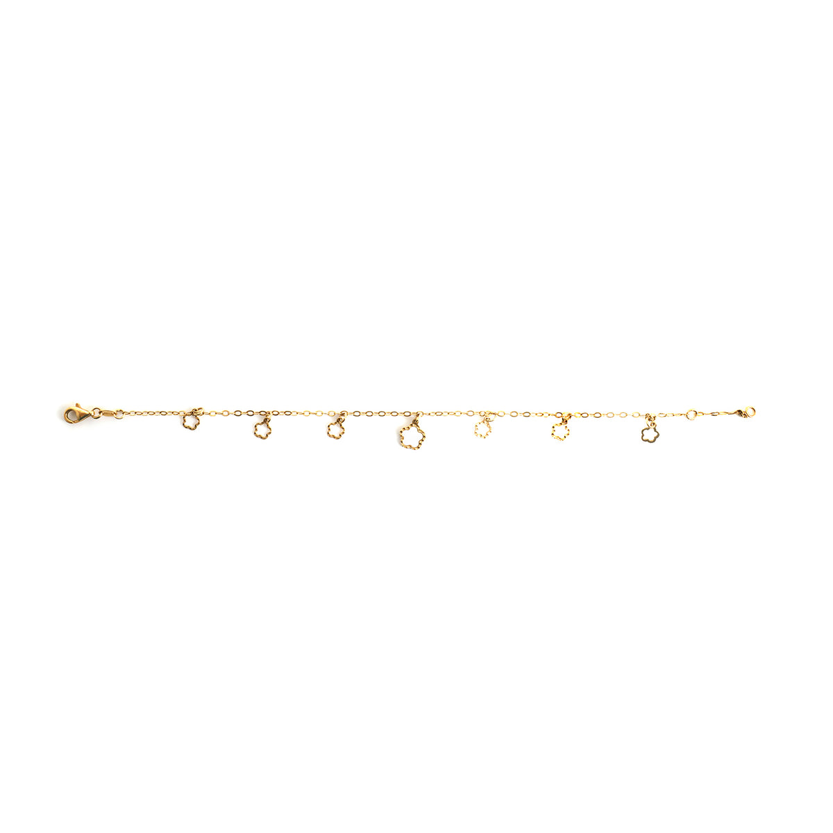 Gold bracelet with small round charms on a white background