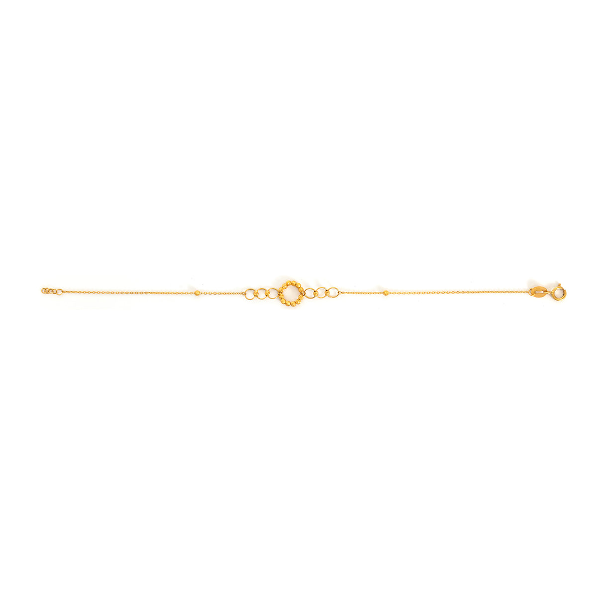 Gold bracelet on a white background