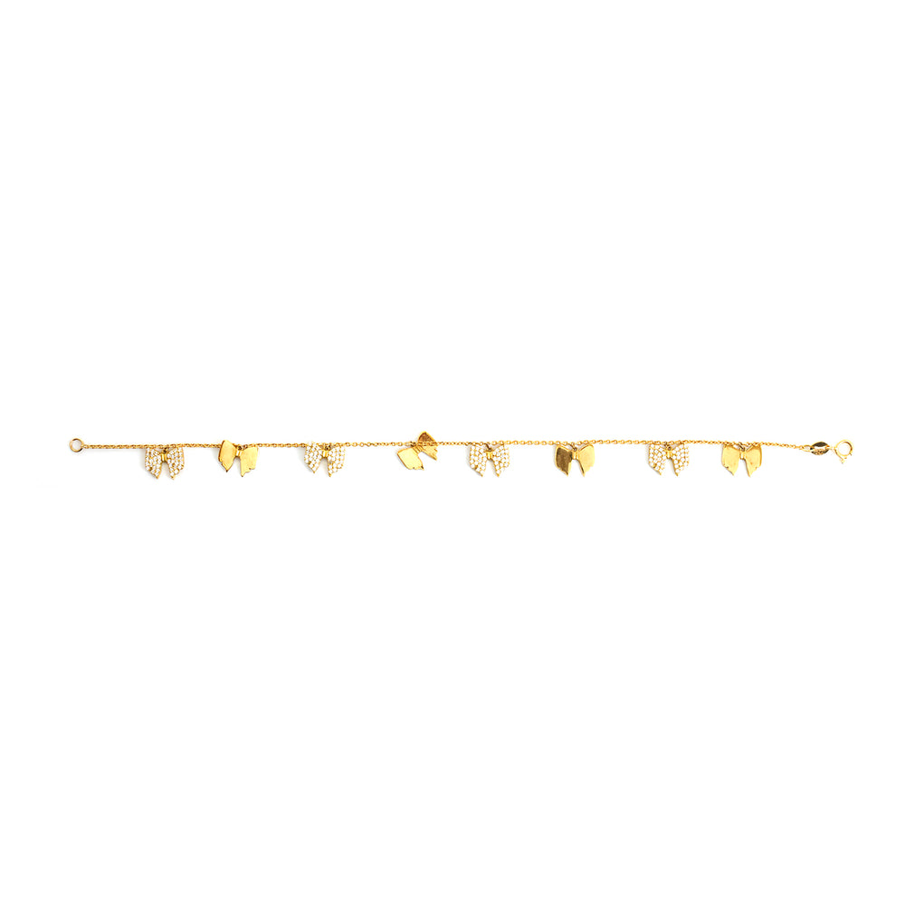 Gold bracelet with leaf-shaped charms on a white background