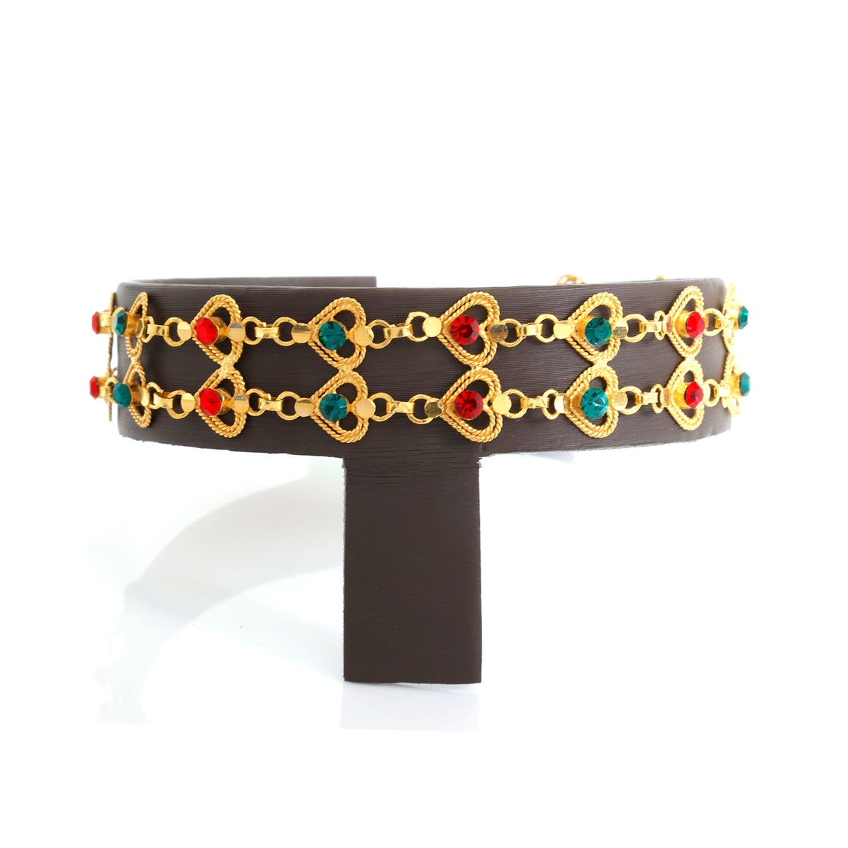 Decorative headband with gold chain design and colorful gemstones on a white background