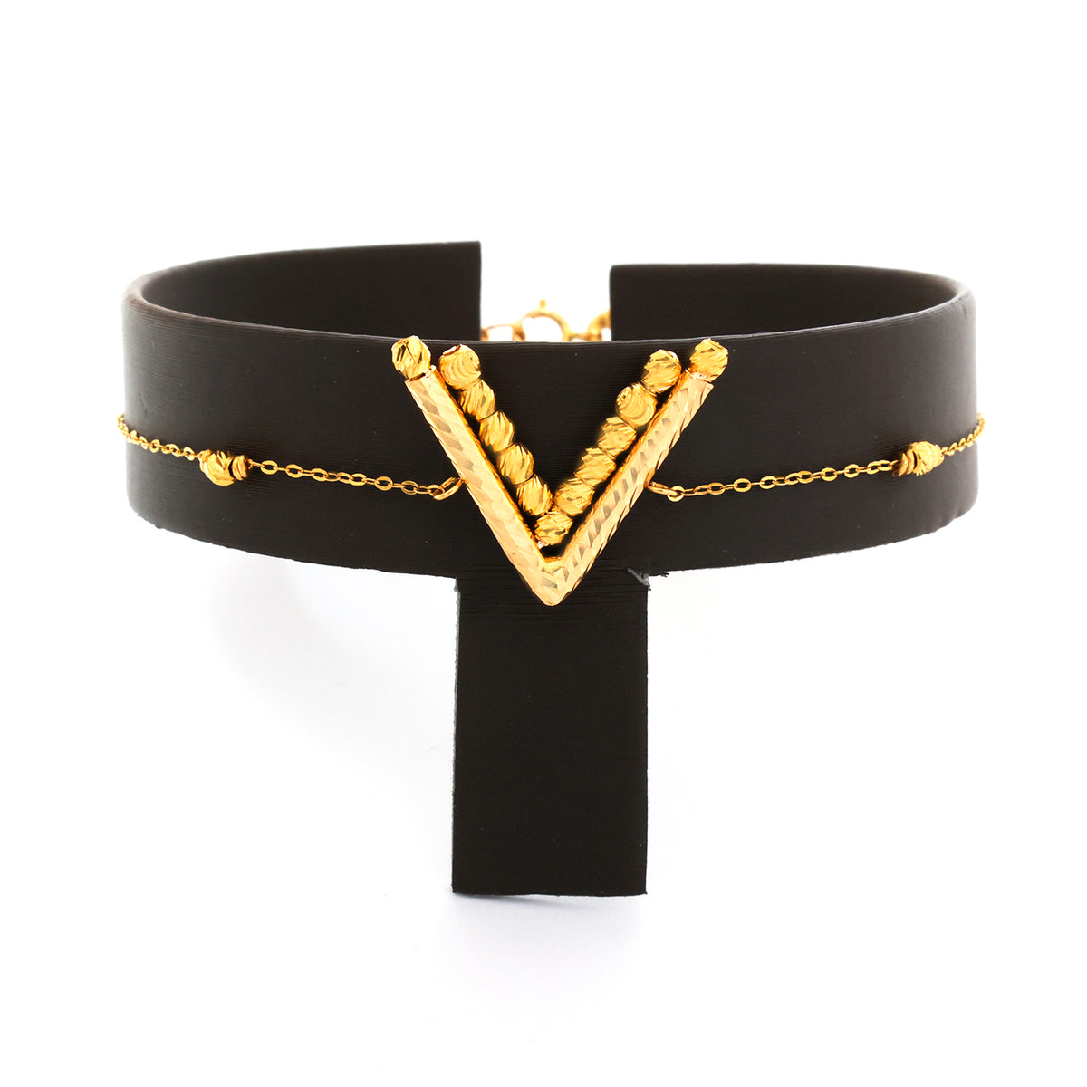 Black belt with gold decorative elements on a white background