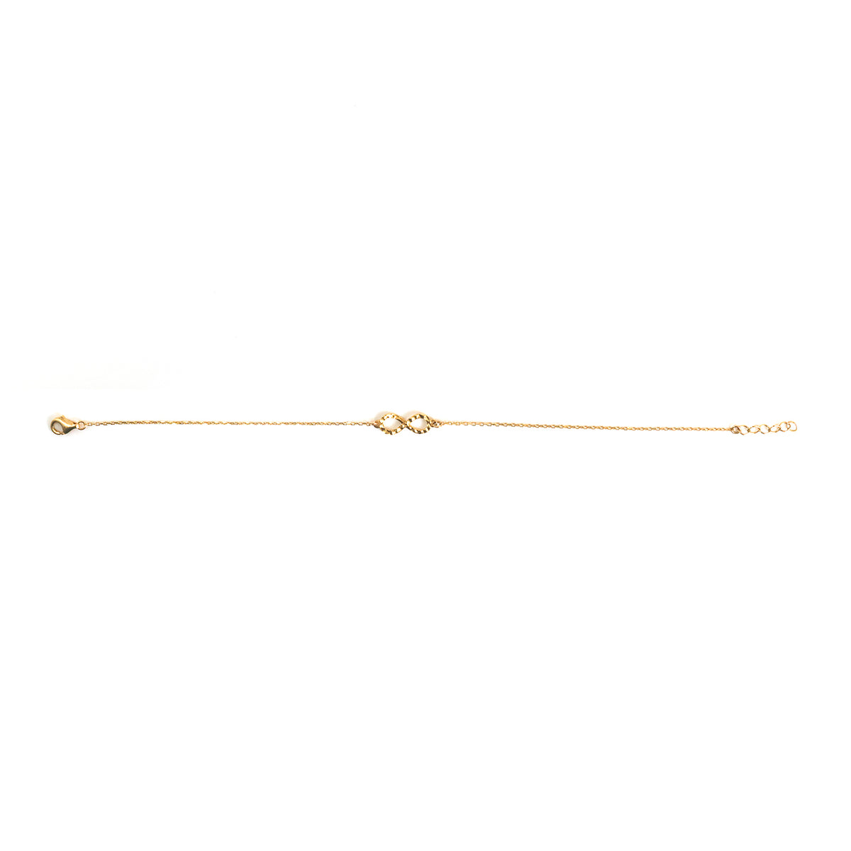 A delicate gold chain bracelet with a small central heart-shaped charm, displayed horizontally on a solid white background.