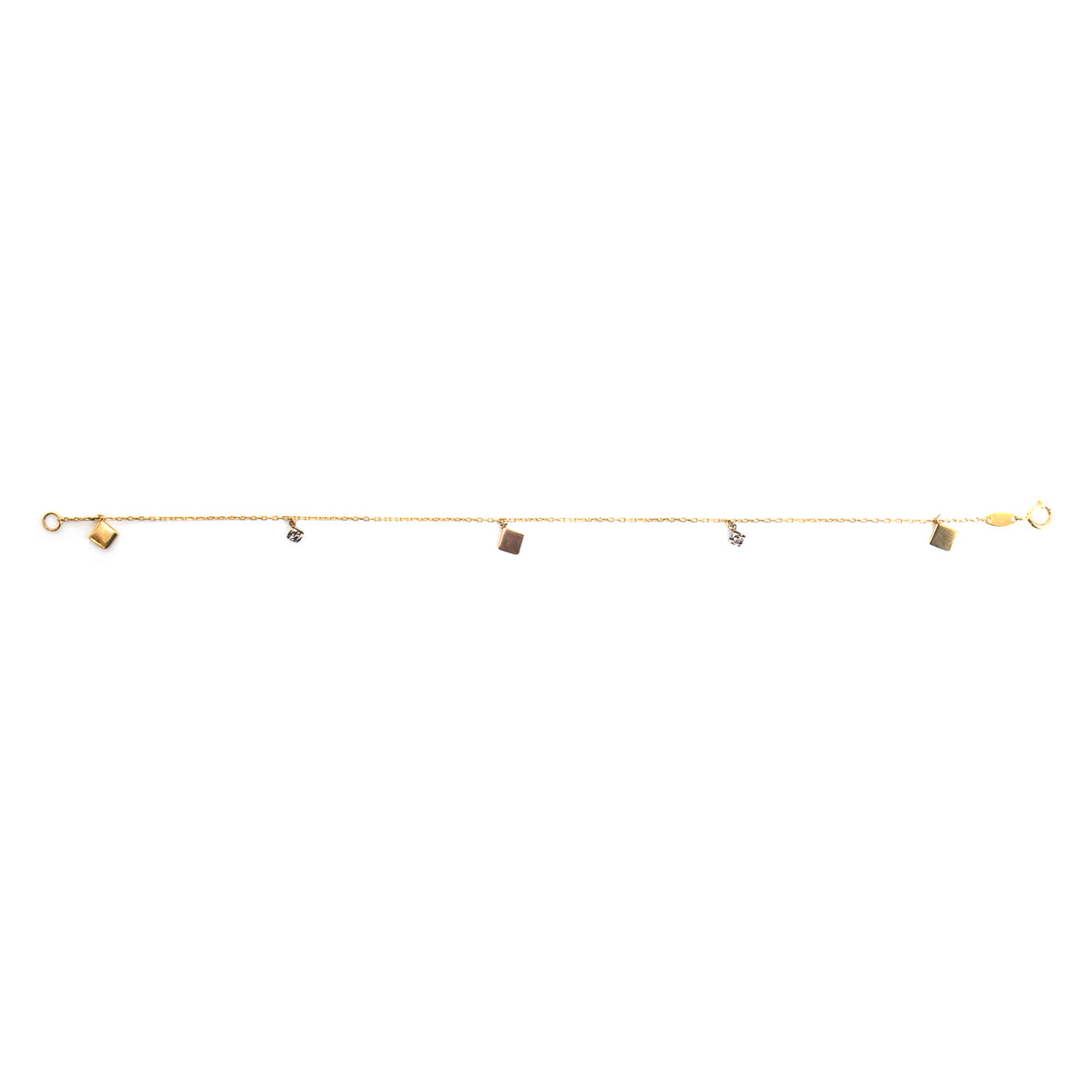 A delicate gold chain bracelet featuring five small, alternating square and round metallic charms, displayed horizontally against a solid white background.