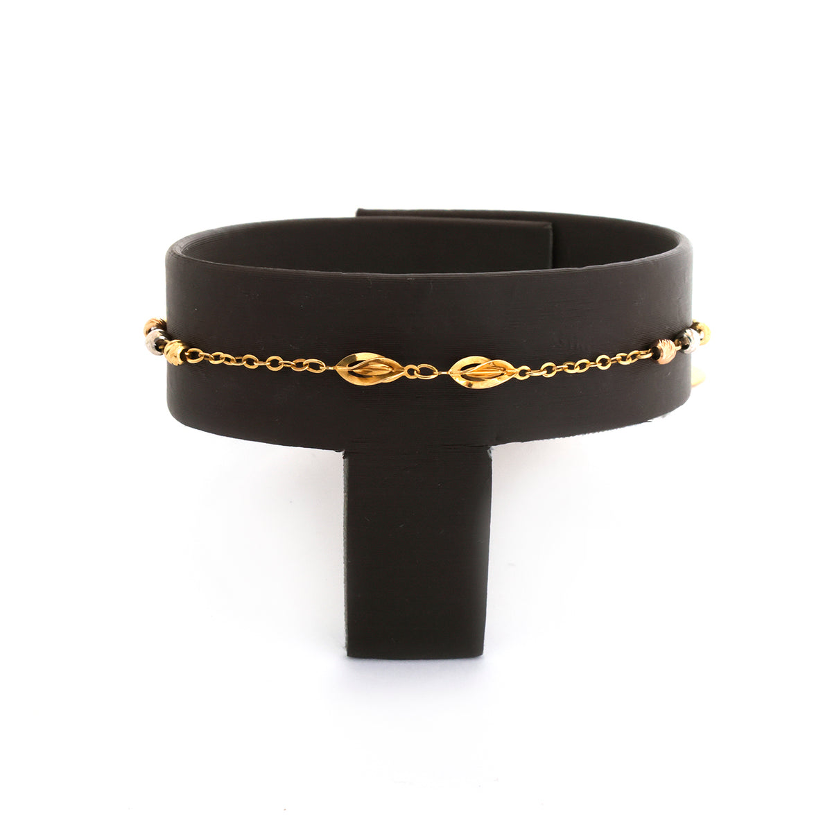 Black leather belt with gold chain detail on a white background