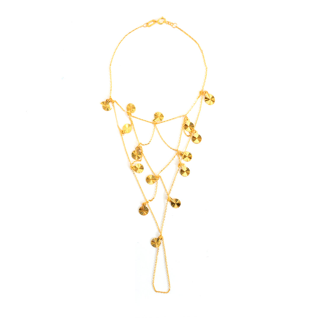 Gold necklace with floral designs on a white background