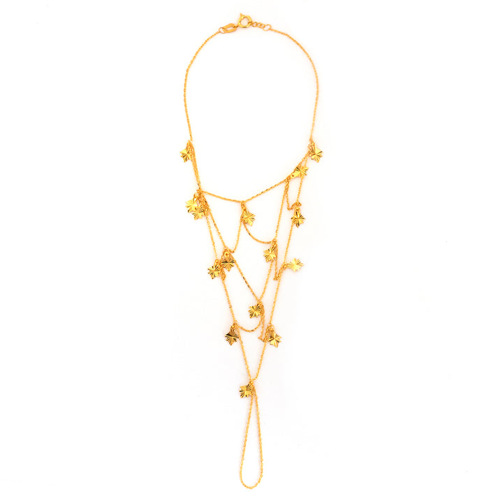 Gold necklace with floral designs on a white background