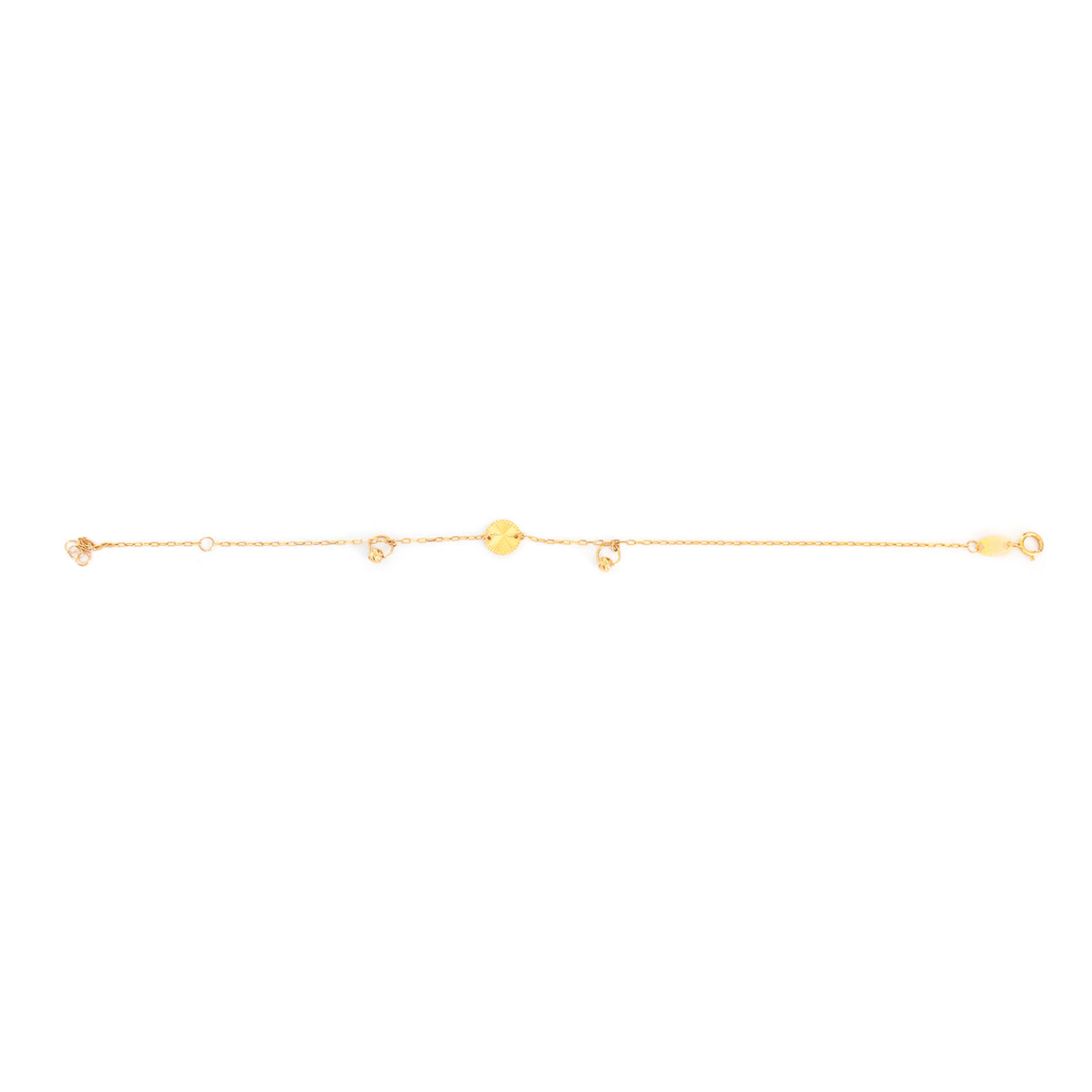 A delicate gold chain bracelet featuring a central round gold disc and small dangling gold charms, shown against a plain white background.