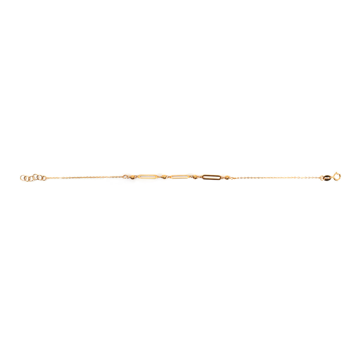 A delicate gold chain bracelet featuring a central bar link motif and small oval accents, displayed horizontally against a plain white background.