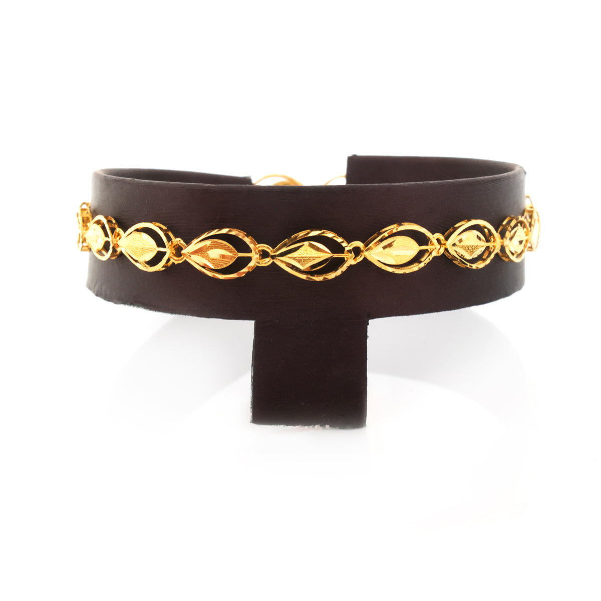 A black leather cuff bracelet featuring a decorative gold metal chain with repeating teardrop and leaf-like links, displayed on a white background.