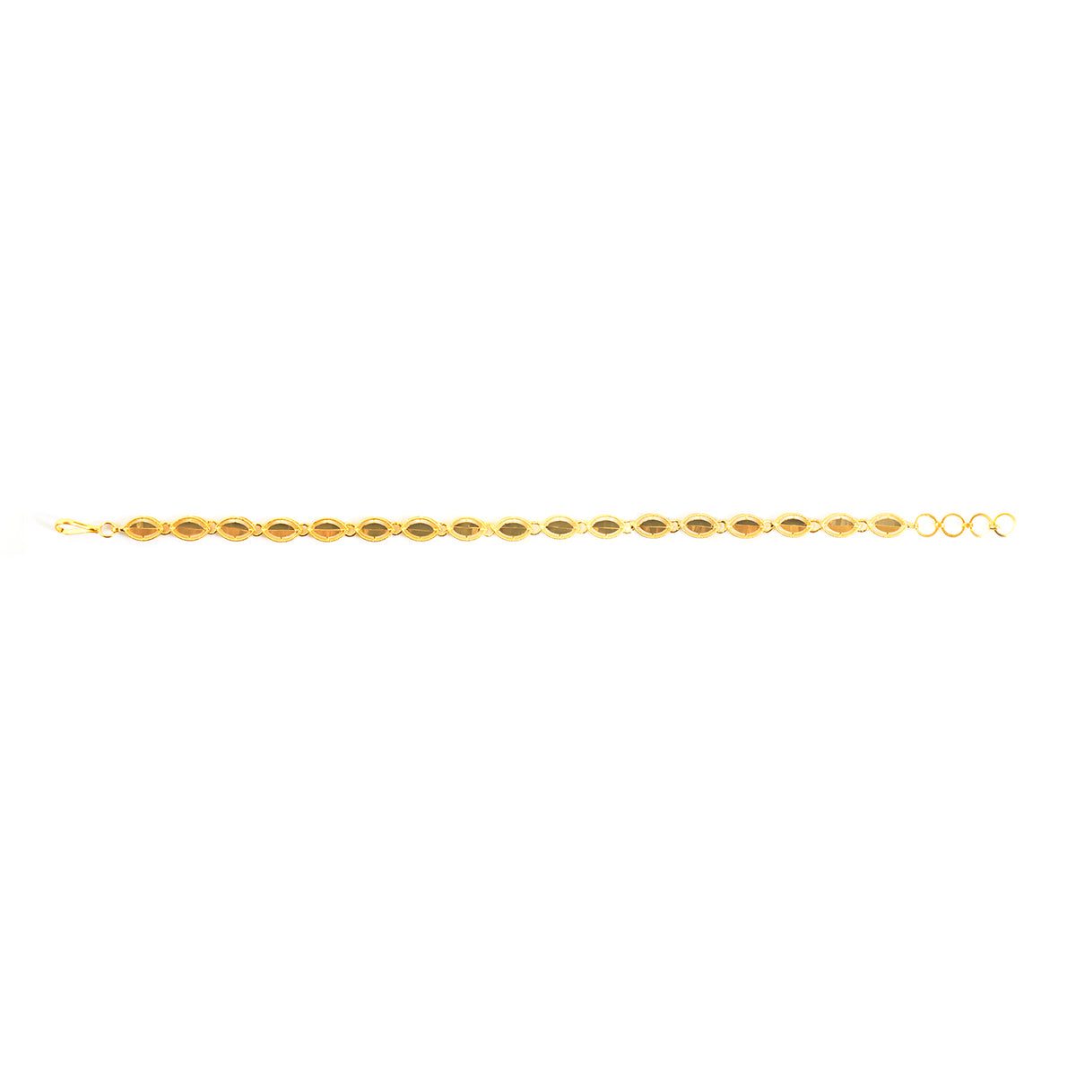 A delicate yellow gold tennis bracelet with elongated oval links, displayed horizontally against a solid white background.