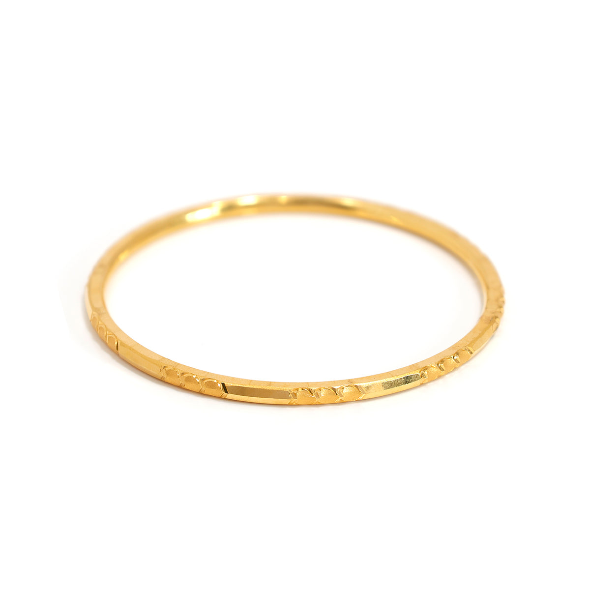 21K Slim Gold Bangle with Faceted Carved Details and Polished Finish - Close View