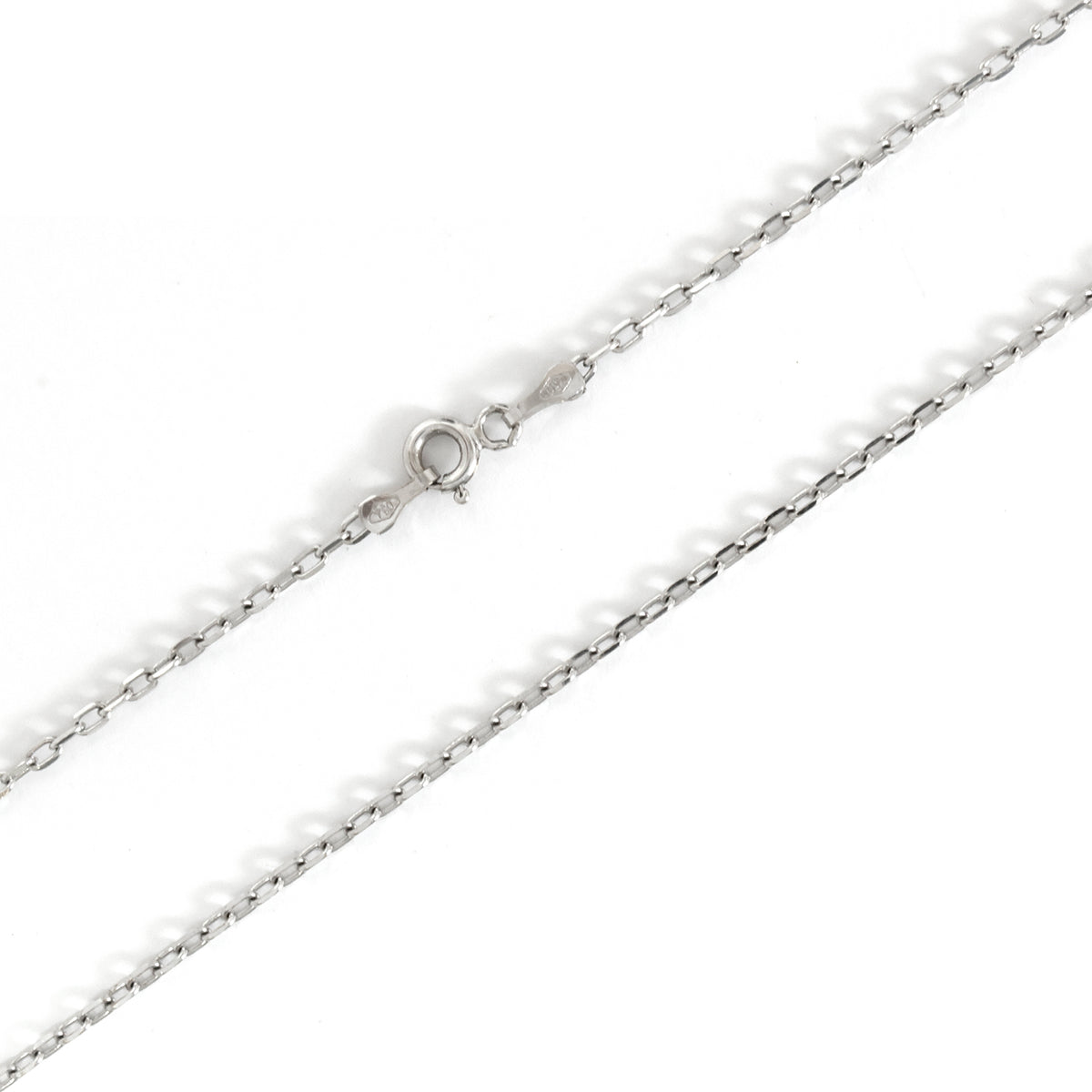 Silver chain necklace on a white background