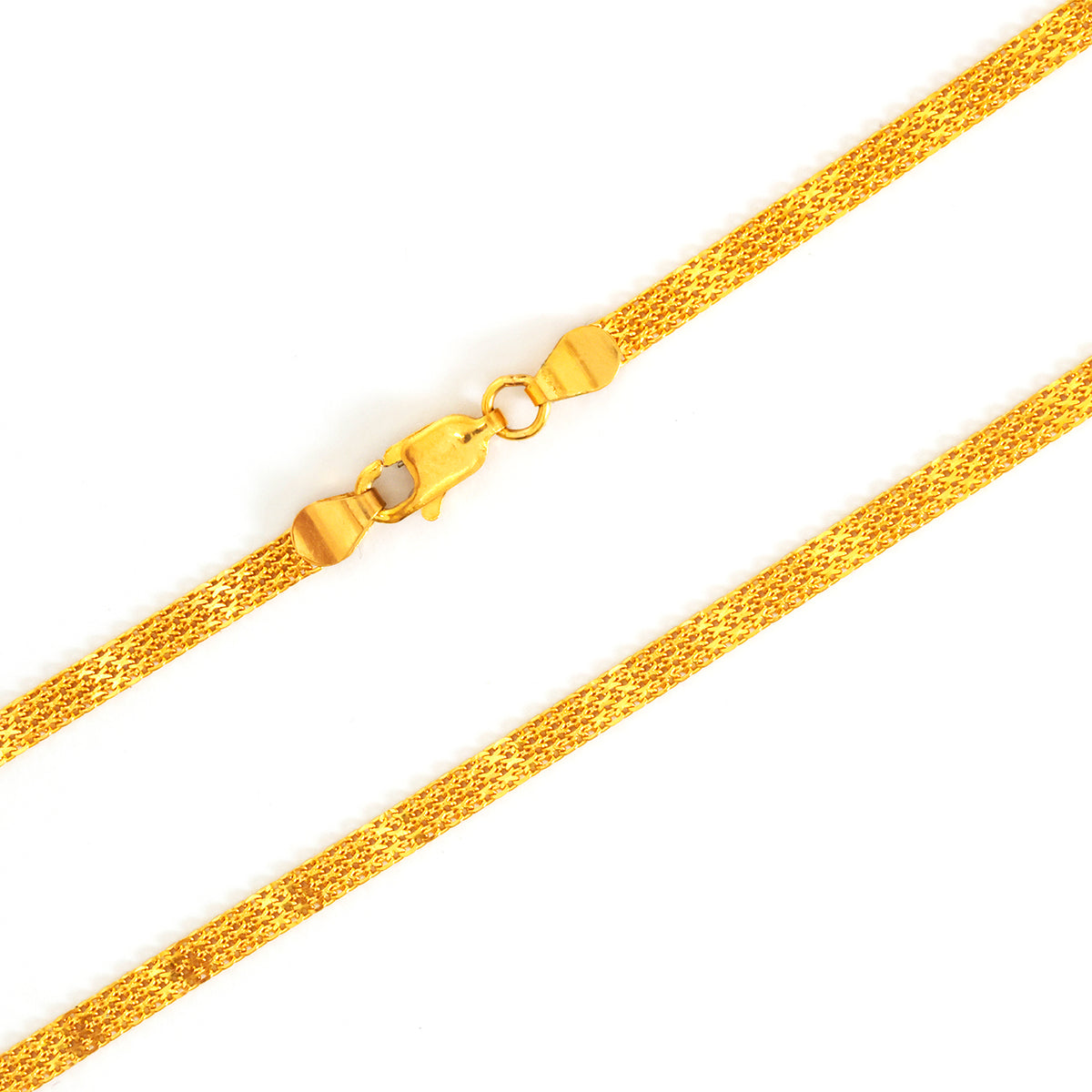 Gold chain necklace on a white background