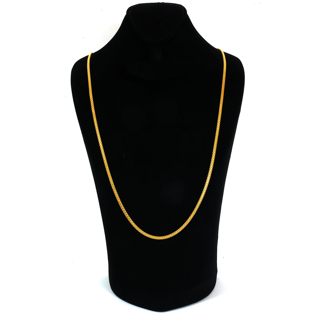 Gold necklace on a black mannequin bust against a white background