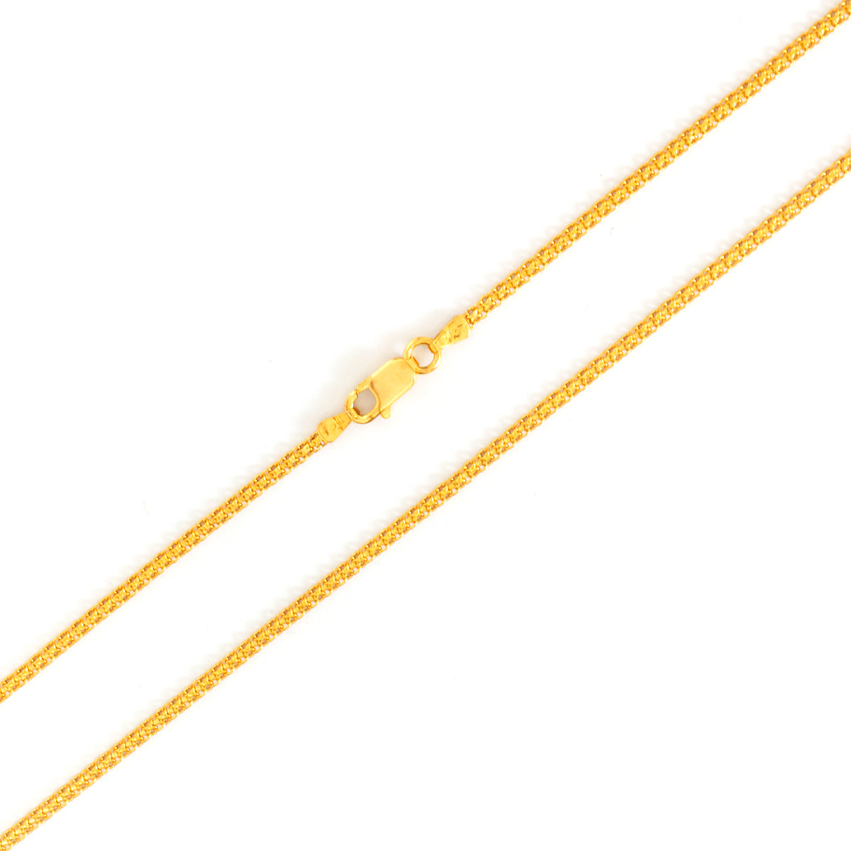 Gold chain necklace on a white background