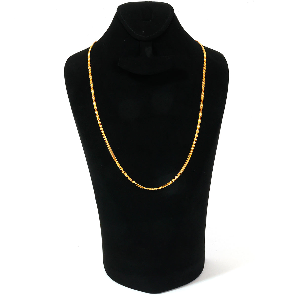 Black turtleneck sweater with a gold necklace on a mannequin against a white background