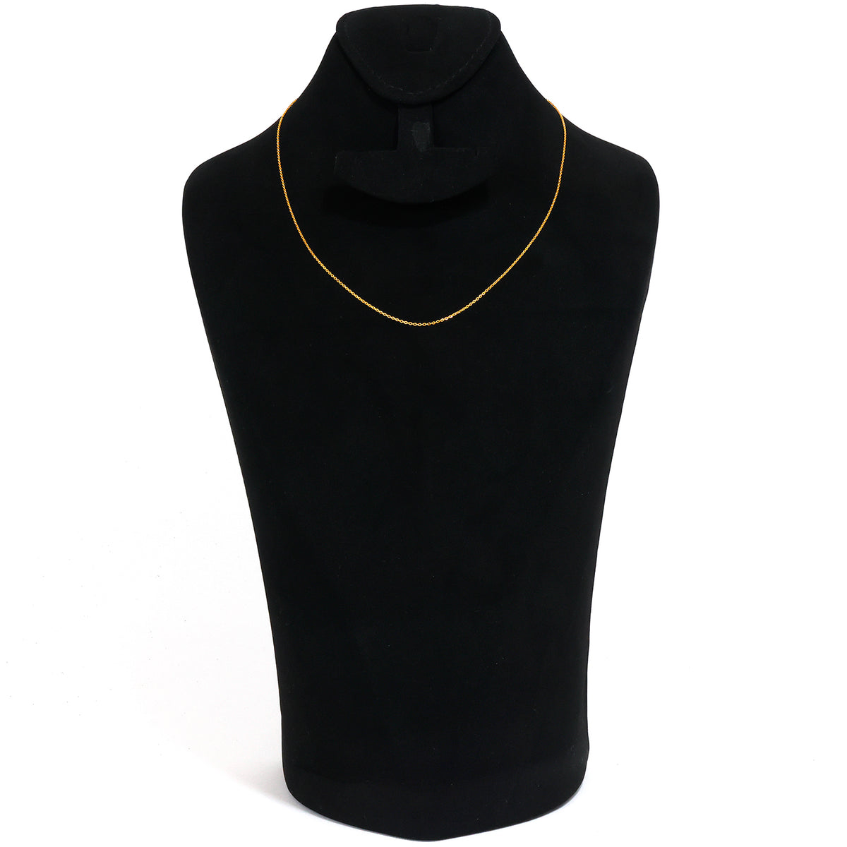 Black turtleneck sweater on a mannequin with a gold trim against a white background