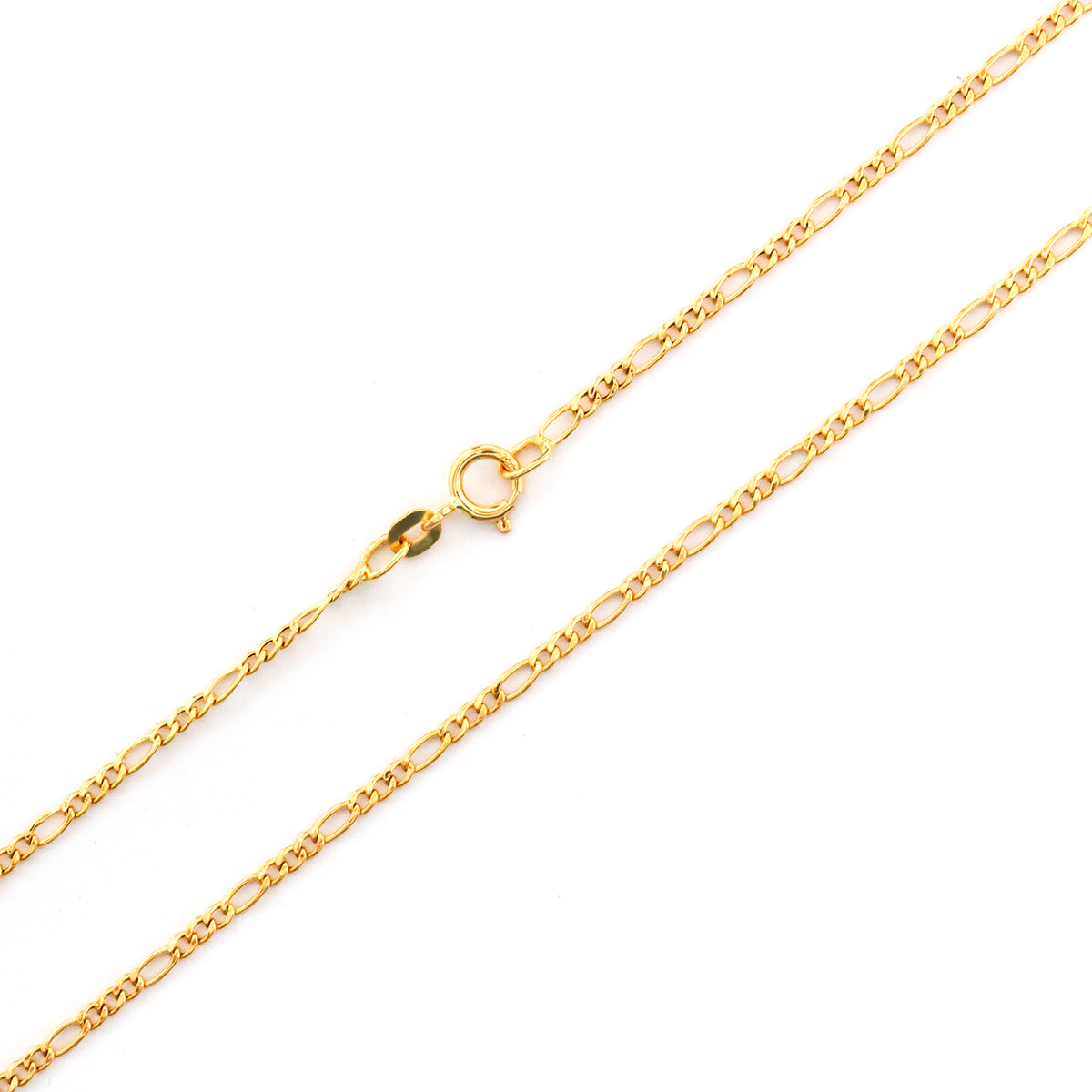 Gold chain necklace on a white background