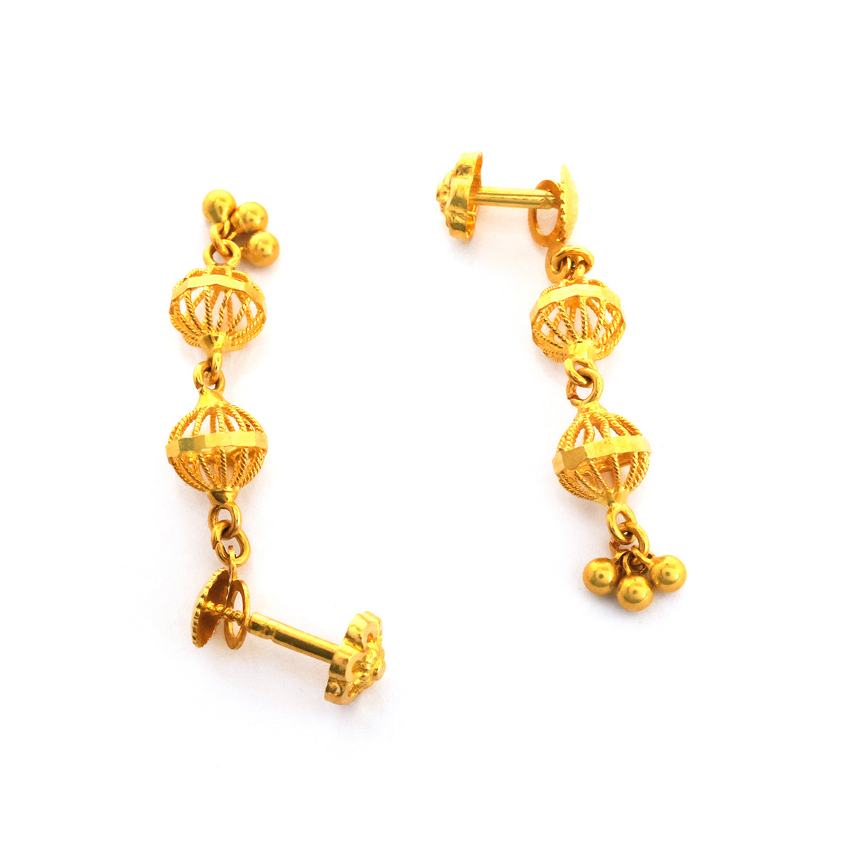 Pair of gold earrings on a white background