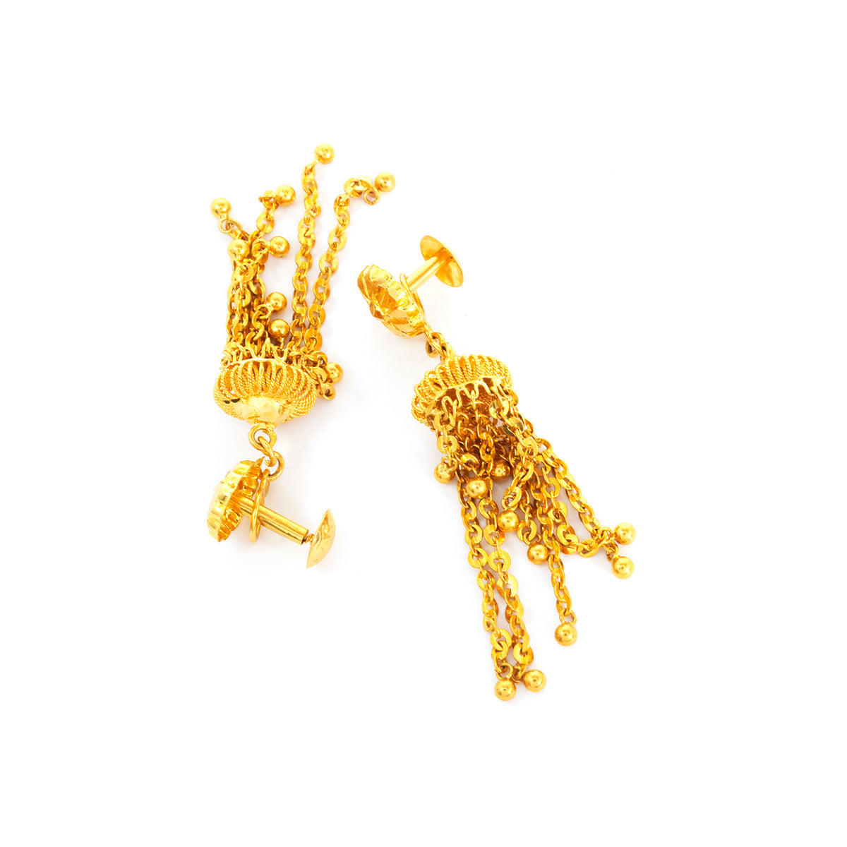 Gold earrings with intricate designs on a white background