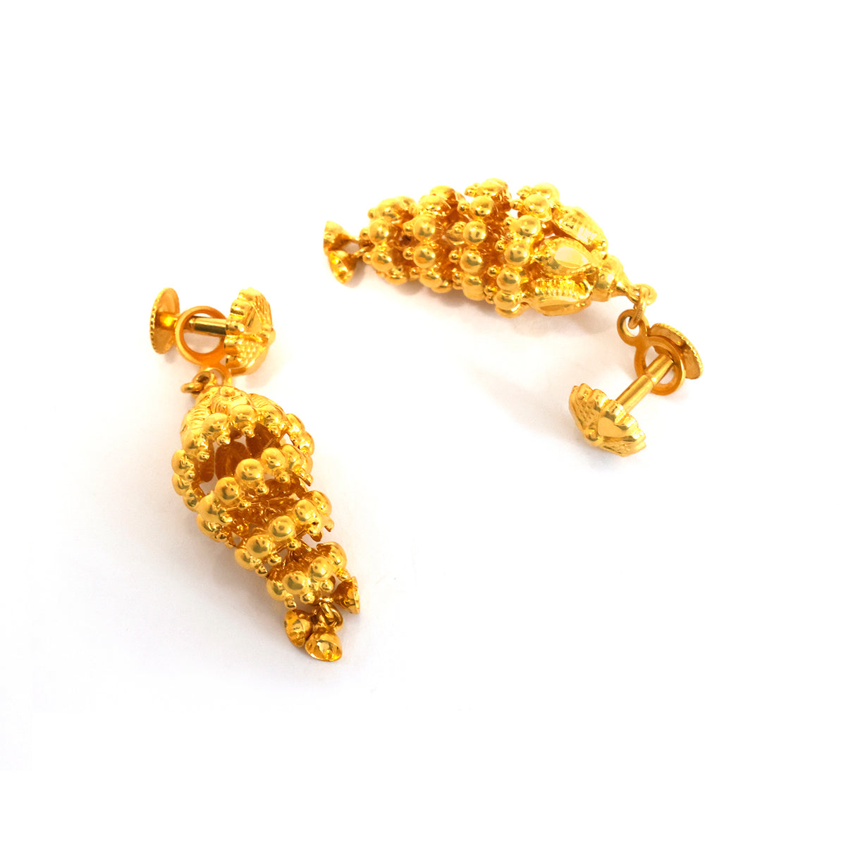 Pair من ذهب أقراط on white background
