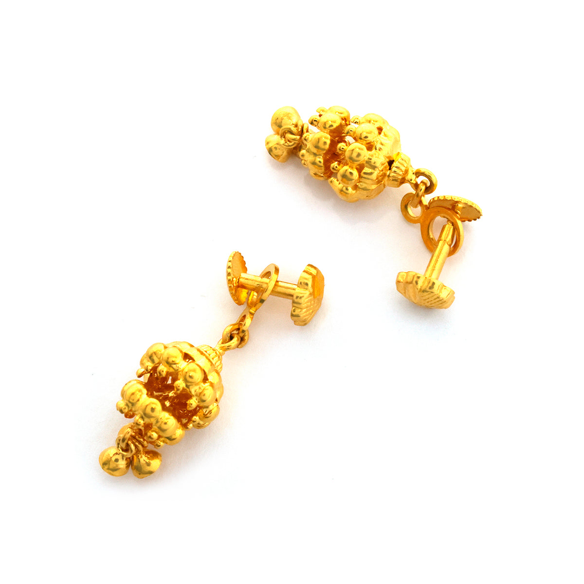 Pair of gold earrings on a white background