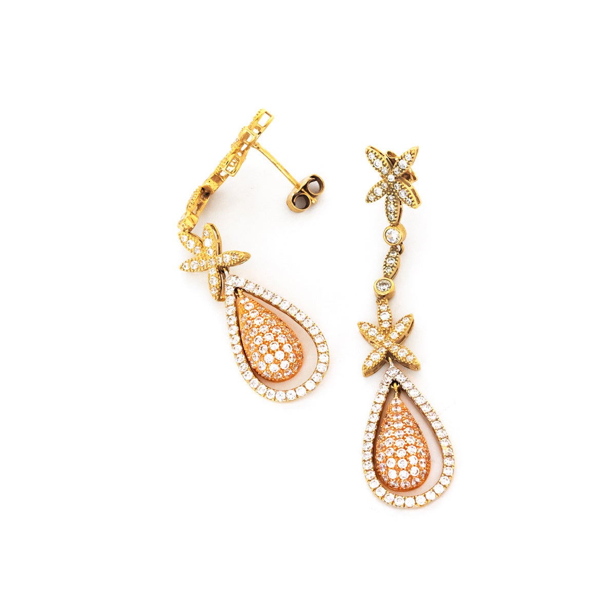 Gold and rose gold earrings with starfish designs on a white background