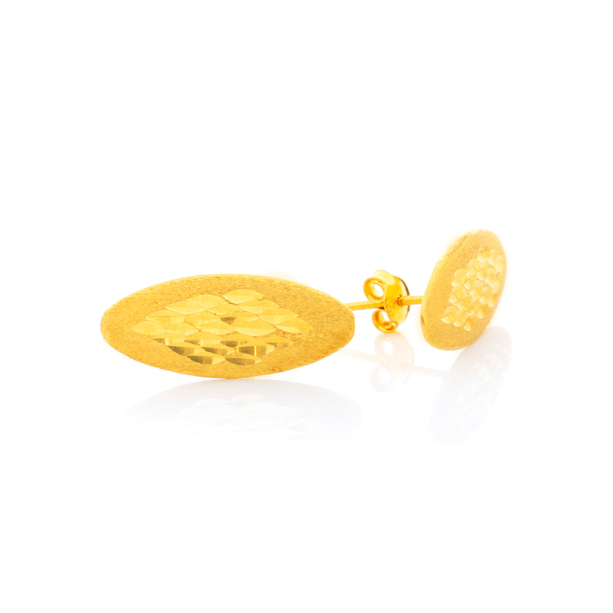 Gold earrings on a white background
