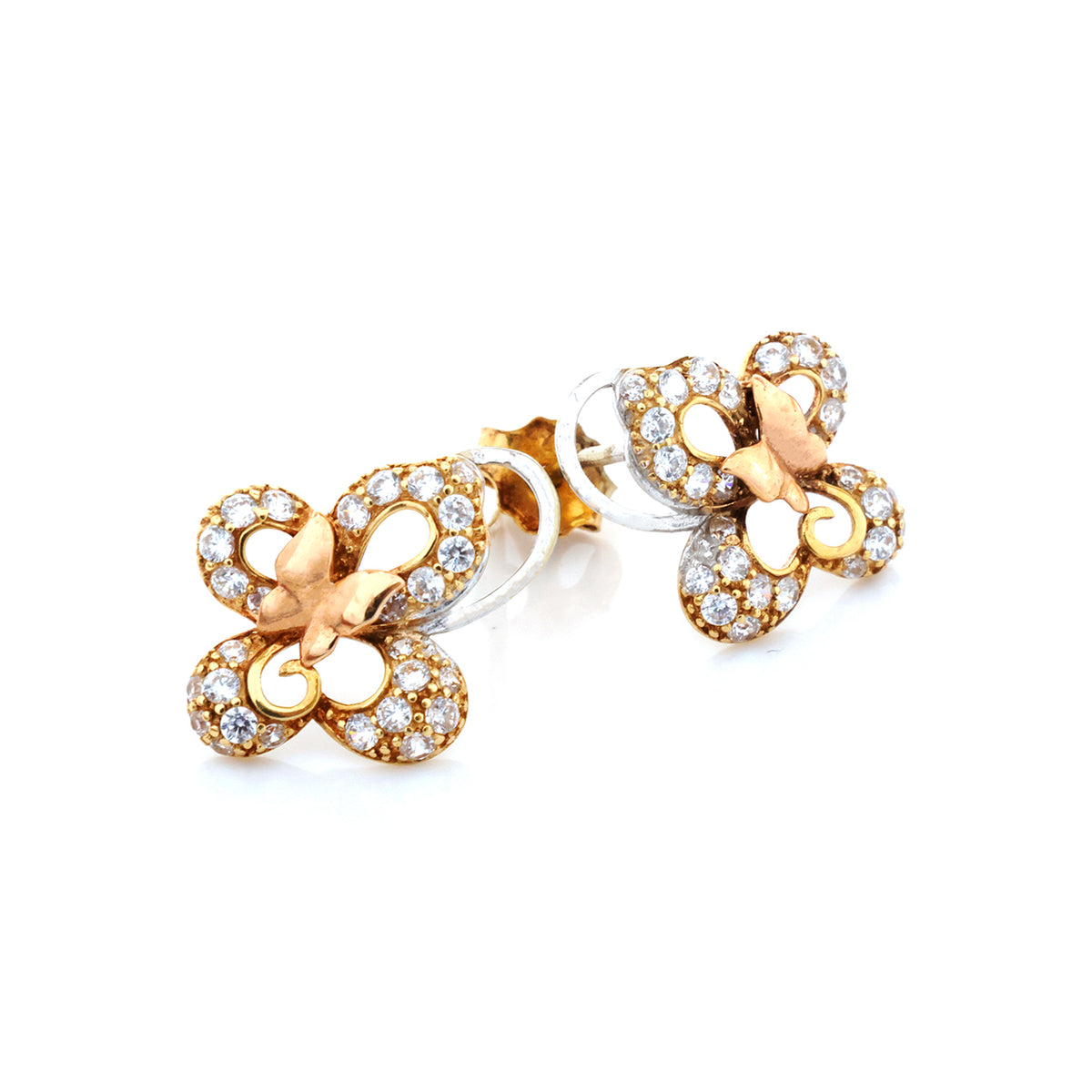 Butterfly-shaped earrings with gold and silver finish on a white background