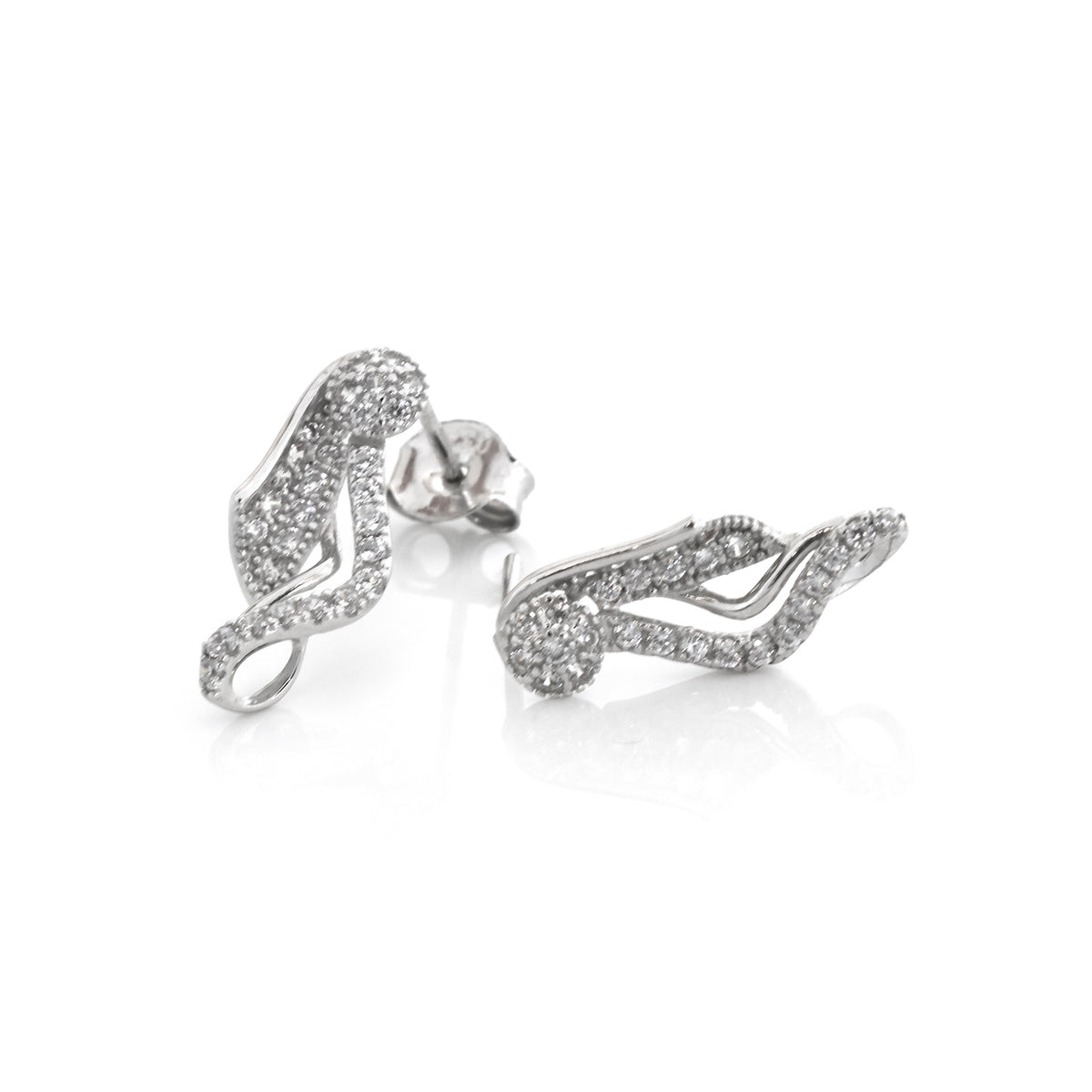 Silver earrings with gemstone accents on a white background