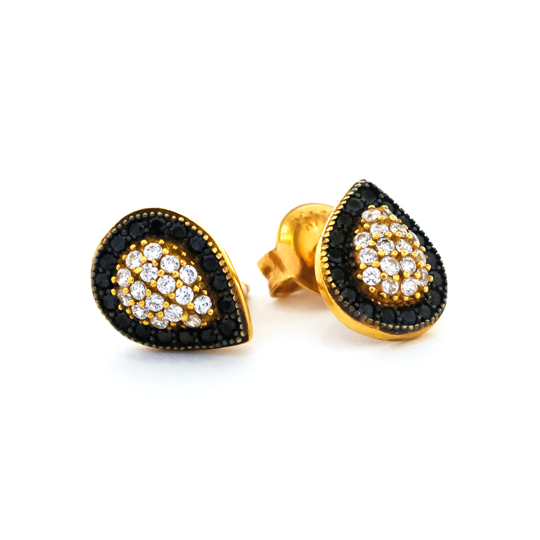 Teardrop-shaped earrings with black and gold accents on a white background
