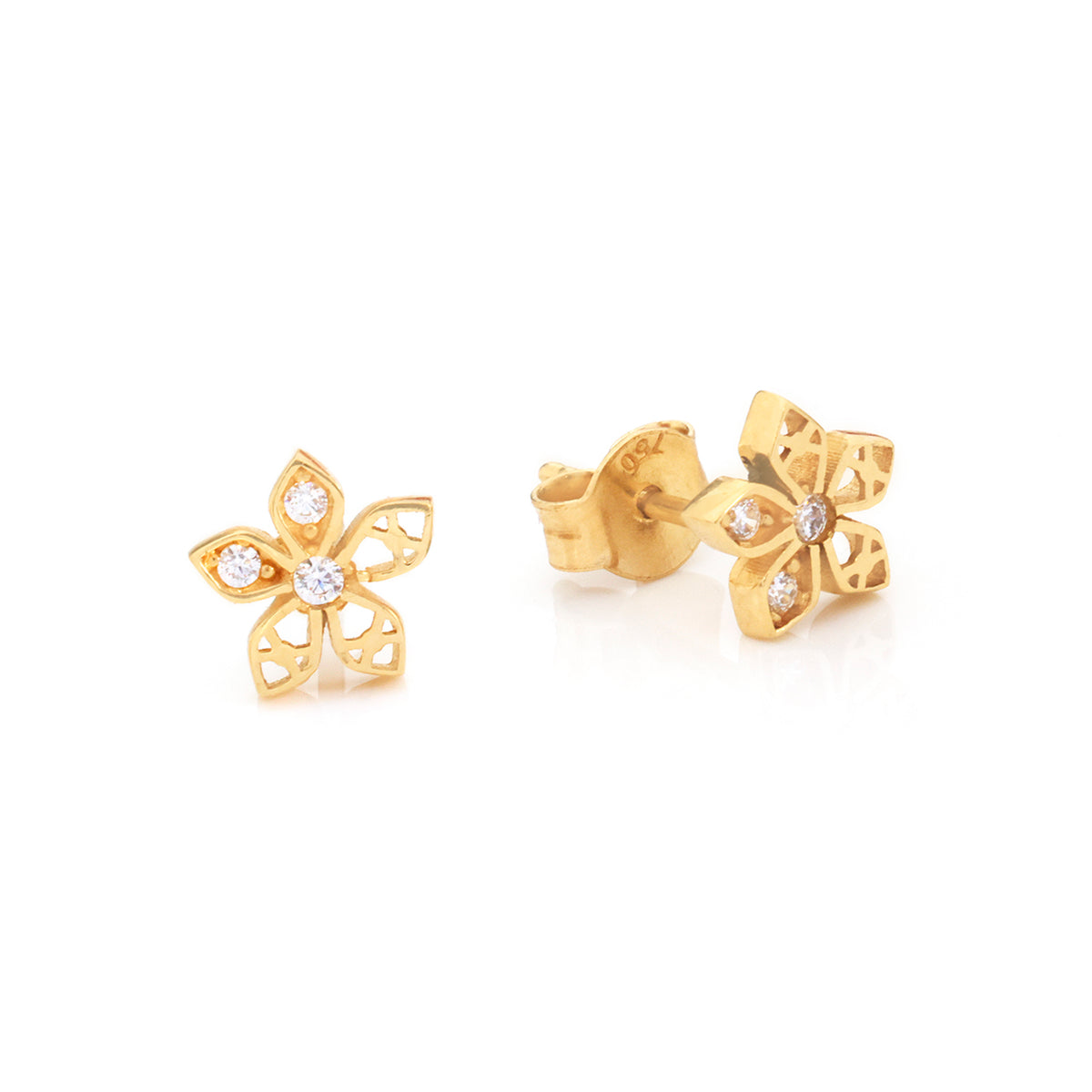 A pair of gold flower stud earrings with small clear gemstones, shown on a clean white background. One earring is facing forward to show the flower face, and the other is turned to show the post and backing.