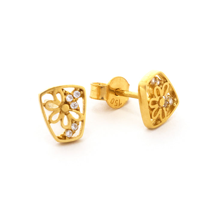 Gold earrings with floral design on a white background