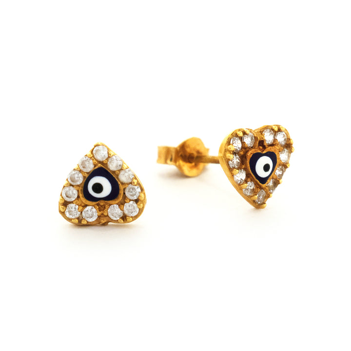 Heart-shaped earrings with eye design and gold border on a white background
