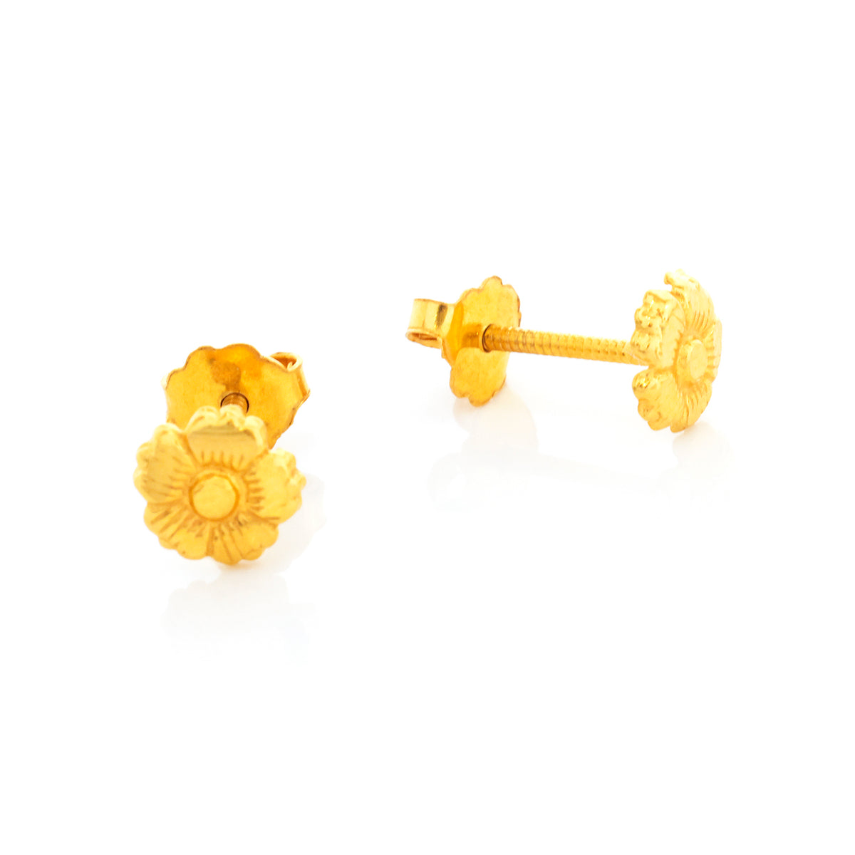 Pair of gold floral earrings on a white background