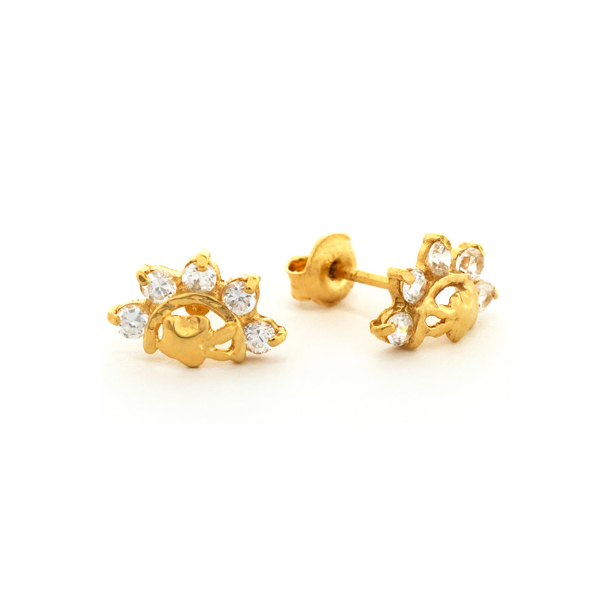 ذهب أقراط مع clear gemstones on white background