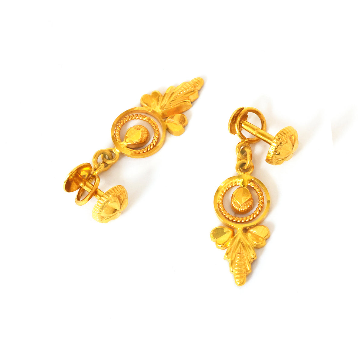 Pair of gold earrings on a white background
