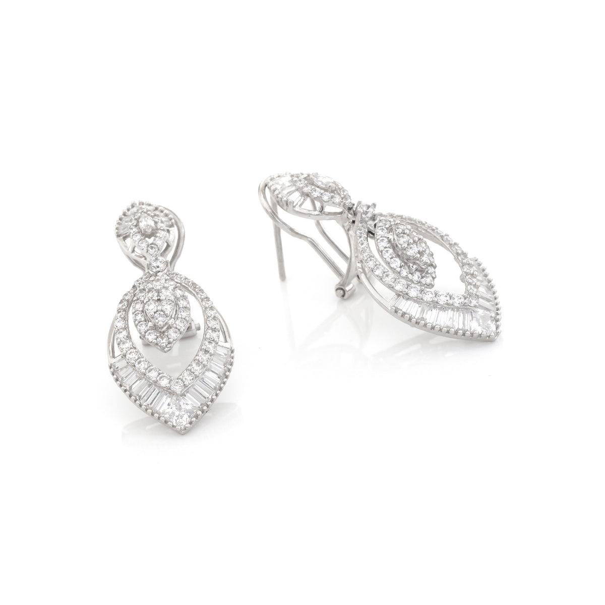 A pair of silver-toned drop earrings adorned with clear baguette and round-cut stones, displayed on a clean white background.