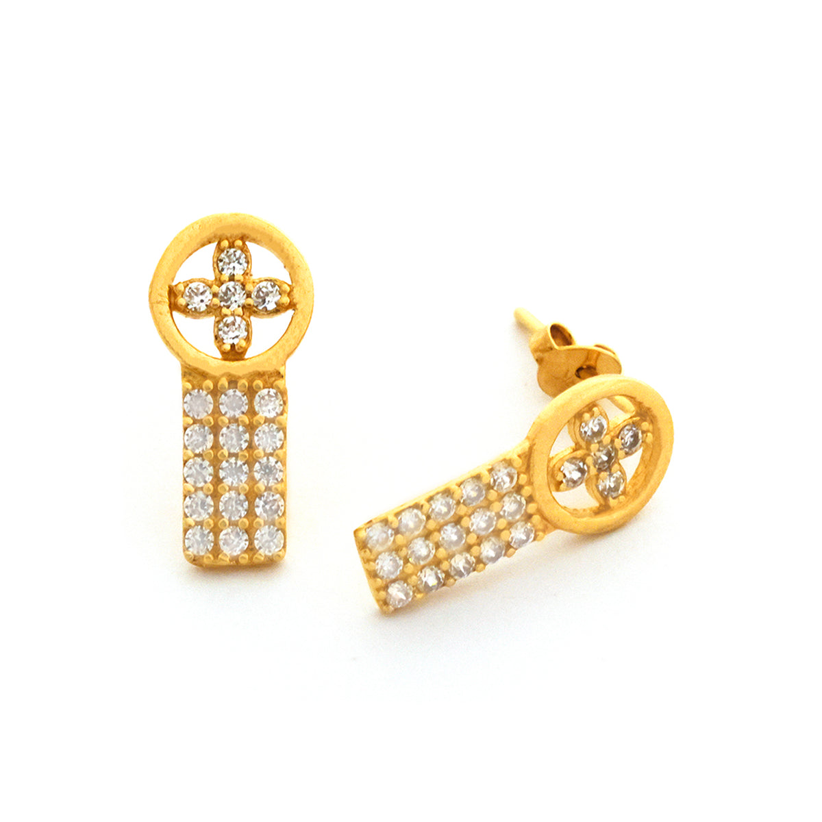 Gold earrings with diamond accents on a white background