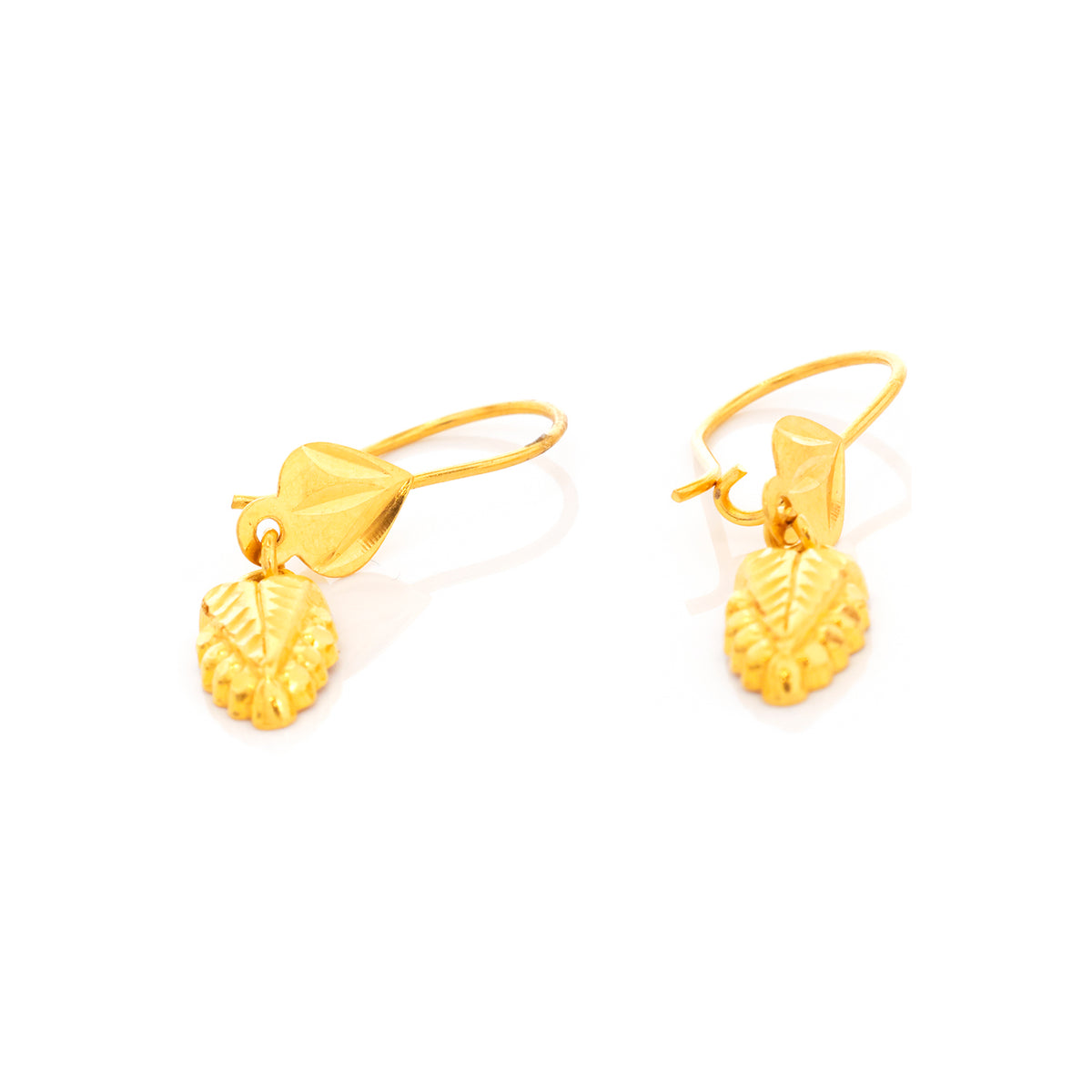 Pair of gold earrings with leaf-like designs on a white background