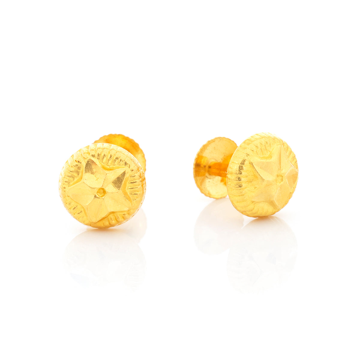 Pair of gold earrings on a white background