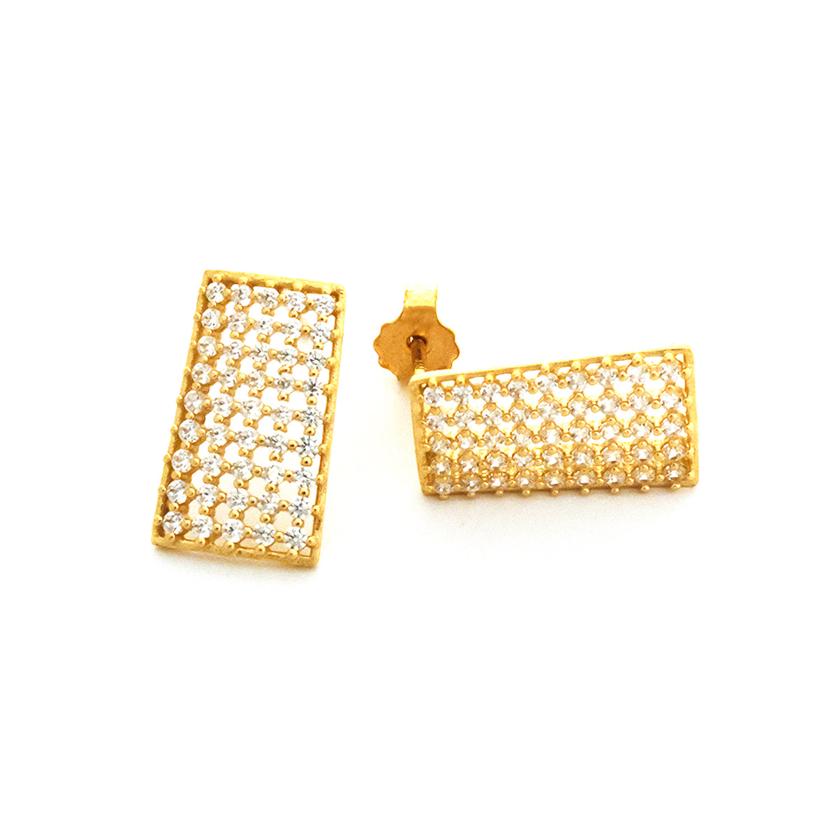 Gold earrings with diamond-like stones on a white background