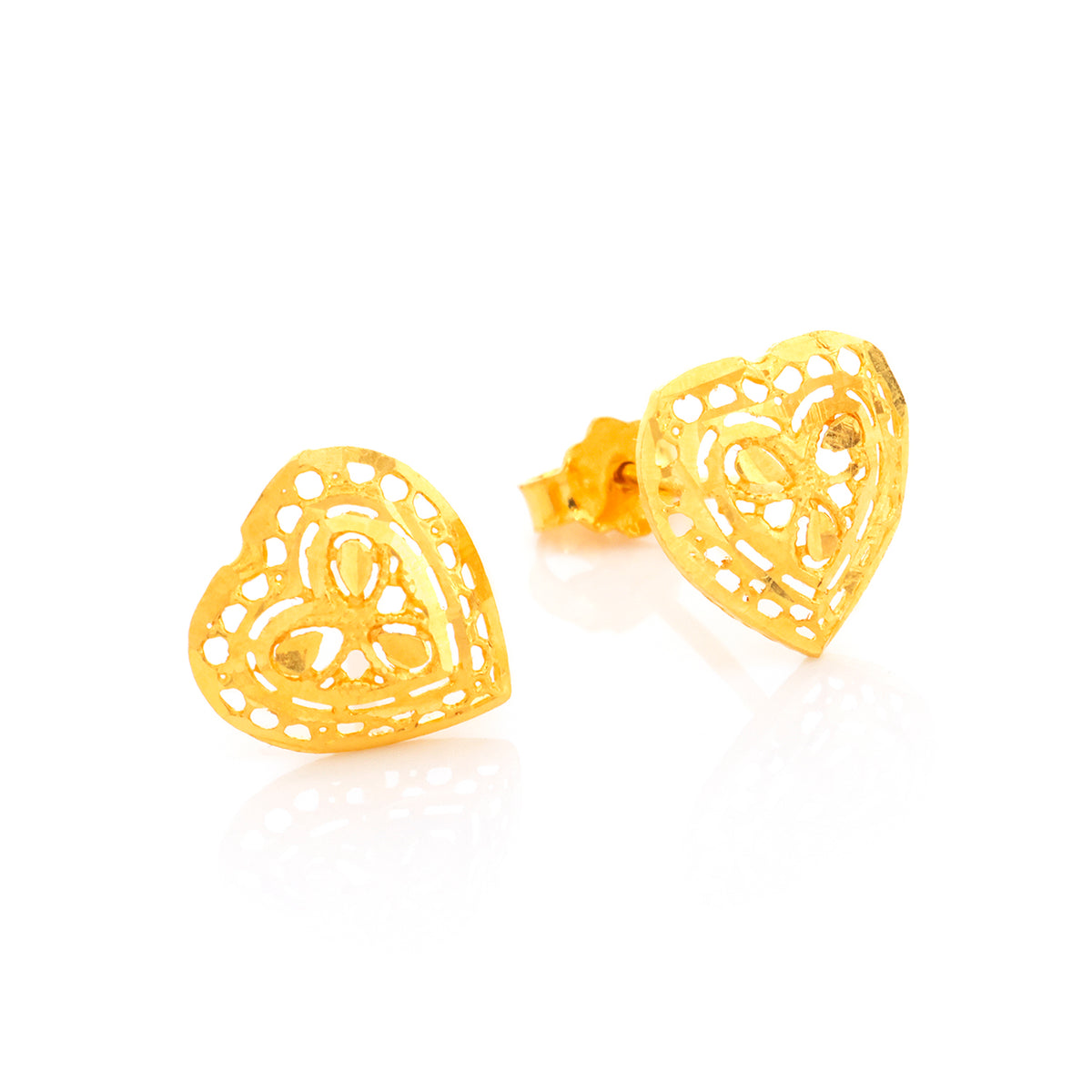 Gold heart-shaped earrings on a white background