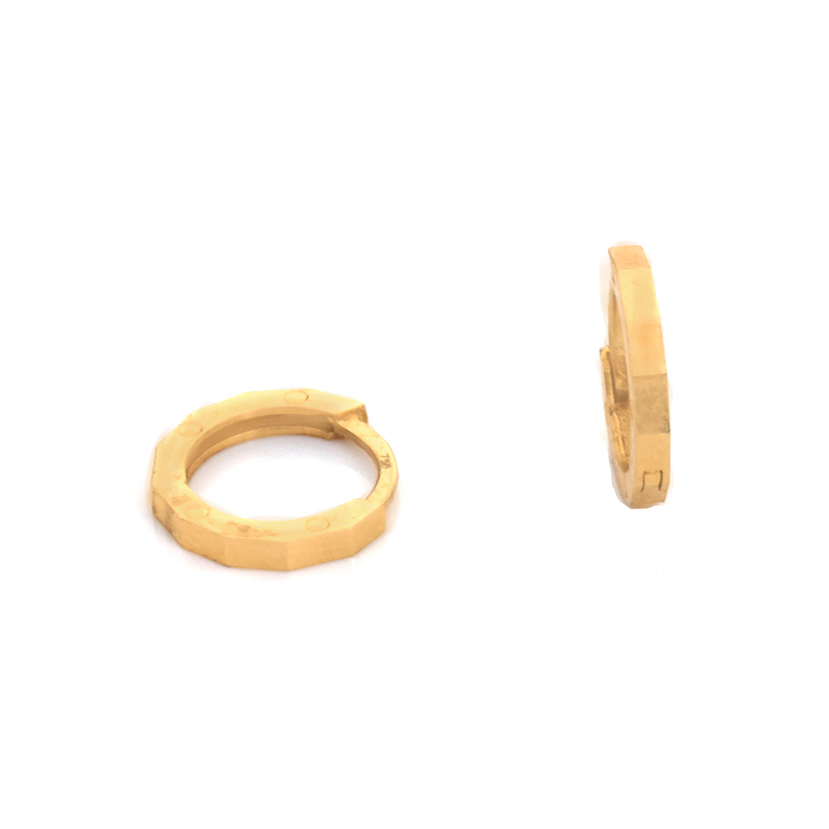 A pair of gold-toned metal hoop earrings shown on a plain white background, with one earring facing forward and the other in side profile.