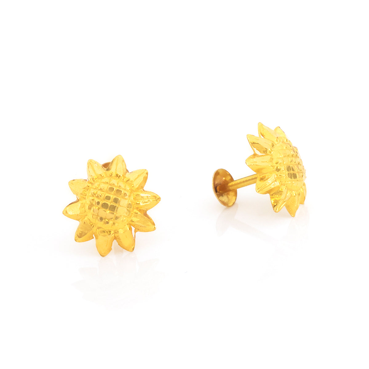 A pair of gold sunflower stud earrings on a clean white background, with one earring facing forward to show the textured center and petals, and the other angled to show the post and backing.