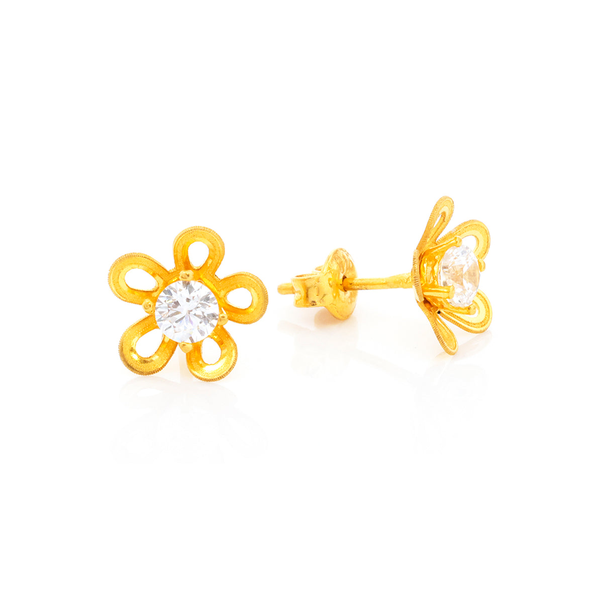 Gold flower-shaped earrings with clear gemstones on a white background